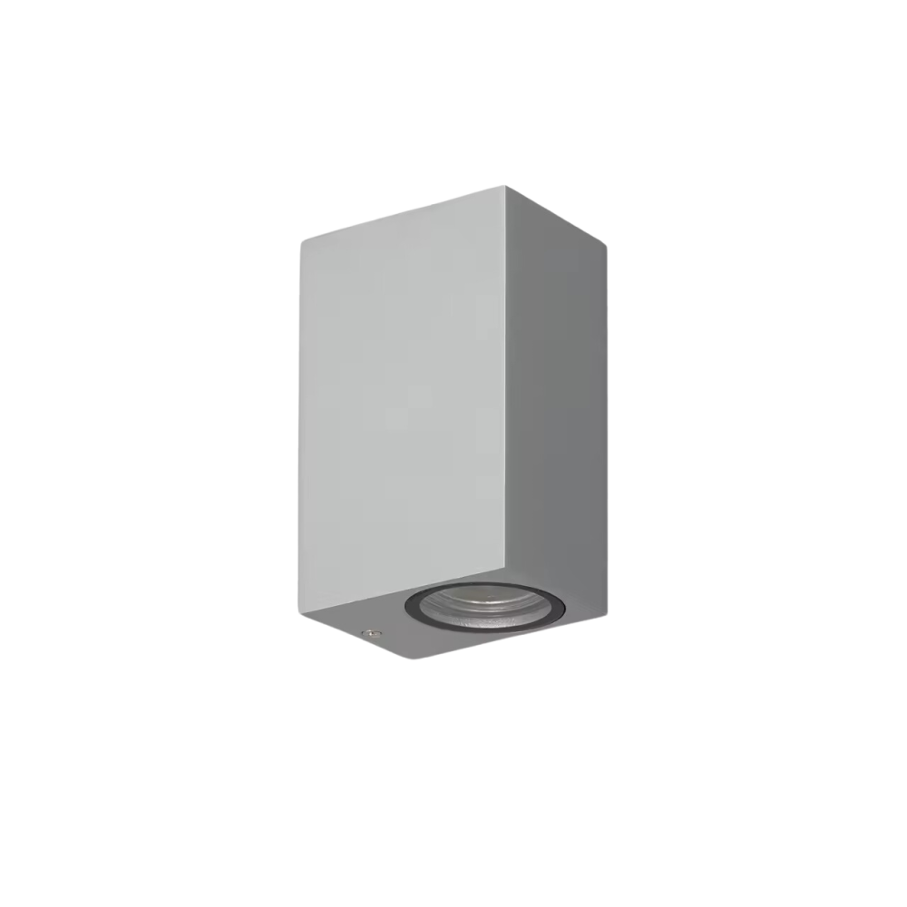 Aplique de pared exterior moderno de aluminio gris, unidireccional, ideal para iluminación exterior con protección IP54.