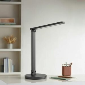 Lámpara de escritorio LED negra con carga inalámbrica y puerto USB, ideal para dormitorio, oficina o estudio. Diseño moderno y elegante.