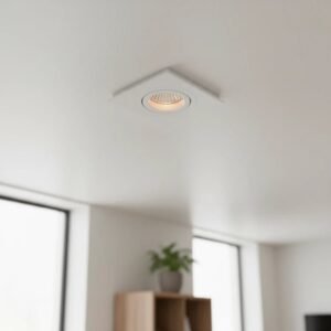 Spot de embutir GU10 orientable blanco de aluminio, instalado en un techo moderno. Ideal para iluminación interior.