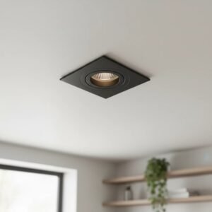 Spot de embutir GU10 orientable negro de aluminio en techo blanco.